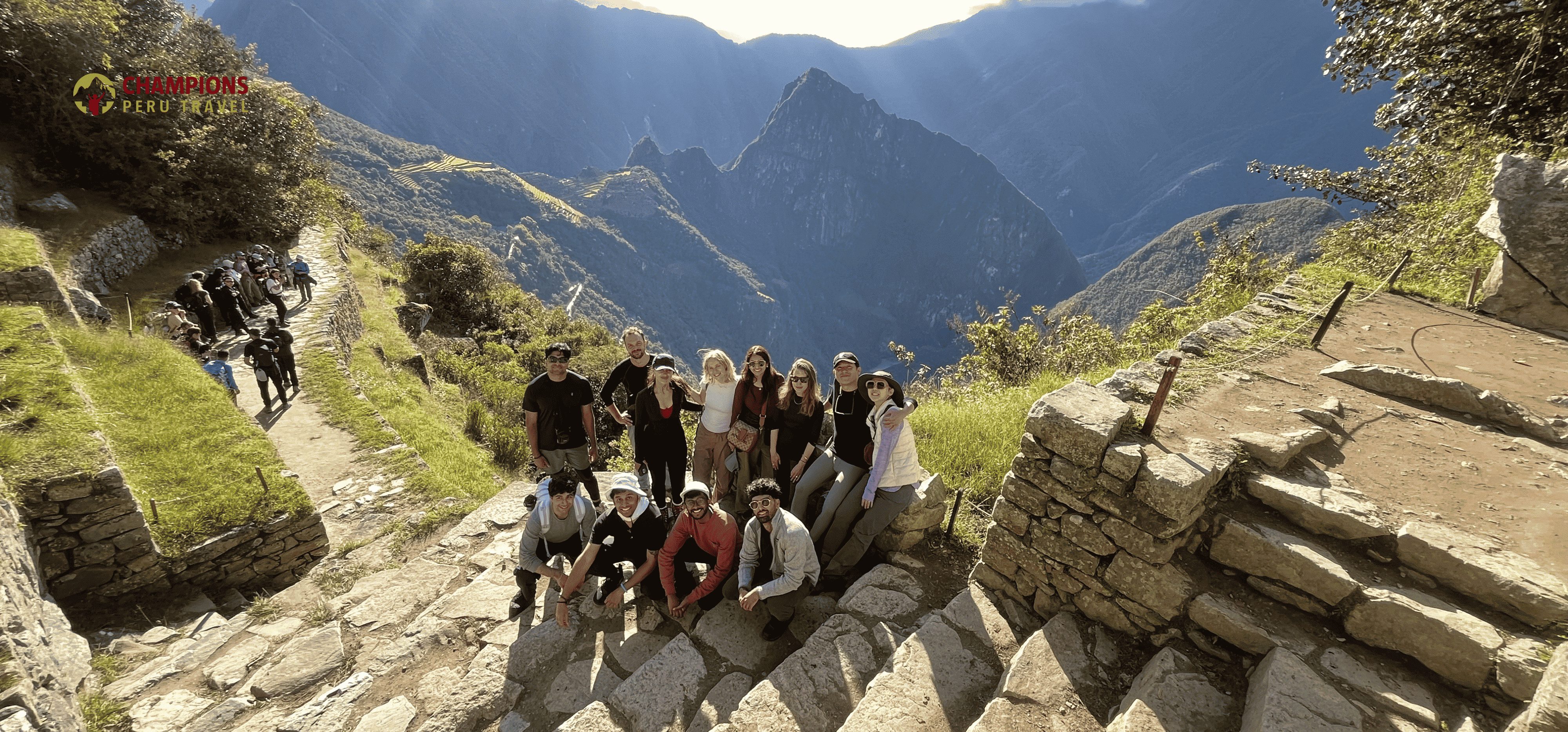 Sun Gate Machu Picchu – Short Inca Trail Experience | Champions Peru Travel happy hikers at Sun Gate Machu Picchu after Short Inca Trail | Champions Peru Travel